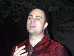Next, Mark clears his throat prior to beginning a lovely acapella rendition of "This Old Man".