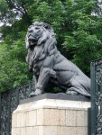 Metal lion guarding the gate from really big magnets